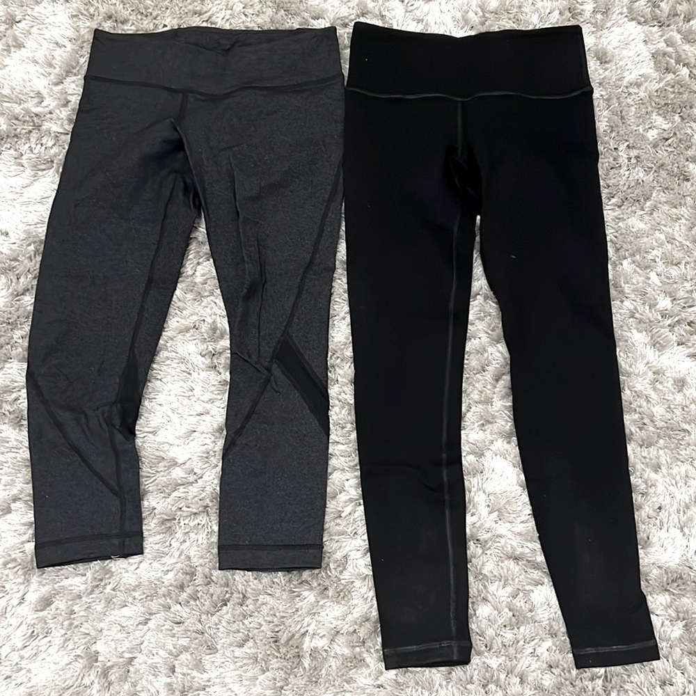 Vimmia grey and black workout leggings. Grey is cropped. Black is 7/8 length
